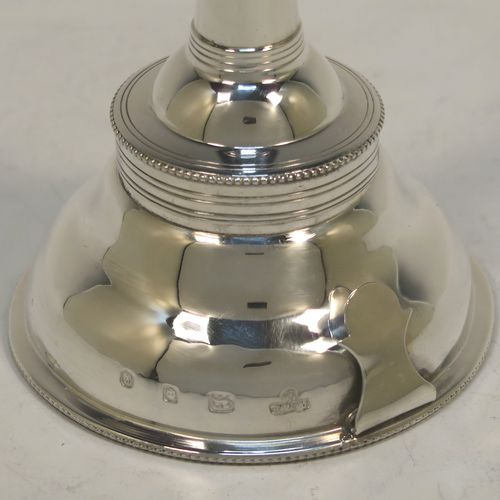 A handsome Sterling Silver wine decanting funnel, having a plain round body with applied bead borders, a plain side clip, and removable funnel. this elegant silver wine decanting funnel was made by A. Chick and Sons Ltd., of London in 1979. The dimensions of this fine hand-made silver wine decanting funnel are height 13.5 cms (5.3 inches), diameter of bowl 8 cms (3 inches), and it weighs approx. 66g (2 troy ounces).