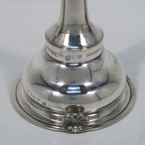 A very elegant Antique Georgian Sterling Silver wine decanting funnel, having a plain round body with applied reeded borders and a cast shell style side clip, an original muslin ring, and original removable funnel with side aeration struts. This handsome silver wine funnel was made by Emes and Barnard of London in 1819. The dimensions of this fine hand-made antique silver wine decanting funnel are height 13.5 cms (5.3 inches), diameter of bowl 9 cms (3.5 inches), and it weighs approx. 98g (3.2 troy ounces).